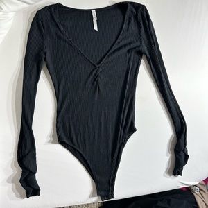 Free people black ribbed long sleeve bodysuit